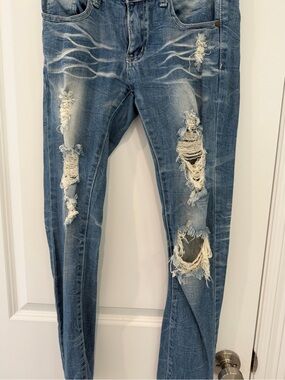Machine Distressed Blue Women’s Jeans - Fashionable Ripped Denim